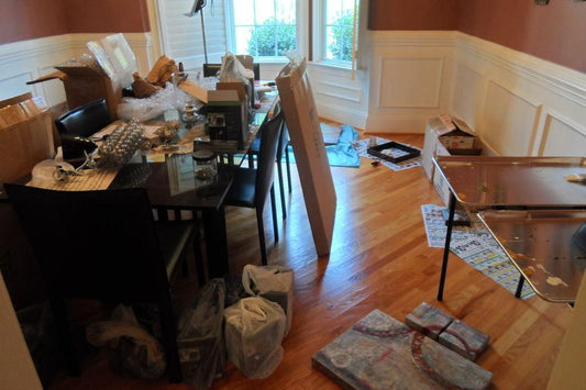 Artist studio encroaching into dining room.