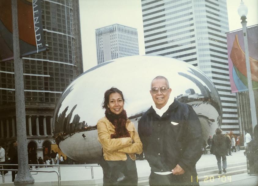 Asian father and daughter at the silver bean in Chicago.
