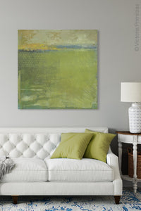 Modern abstract landscape art "Above Anything," digital art by Victoria Primicias, decorates the living room.