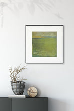 Load image into Gallery viewer, Yellow-green abstract landscape painting &quot;Above Anything,&quot; wall art print by Victoria Primicias, decorates the entryway.
