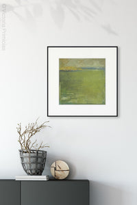 Yellow-green abstract landscape painting "Above Anything," wall art print by Victoria Primicias, decorates the entryway.