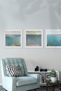 Teal abstract beach art "Admiral Straits," digital print by Victoria Primicias, decorates the living room.