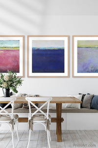 Navy blue abstract beach wall decor "After Hours," digital download by Victoria Primicias, decorates the dining room.