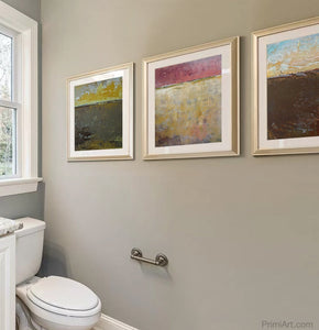 Modern abstract landscape art "Afternoon Delight," digital download by Victoria Primicias, decorates the bathroom.