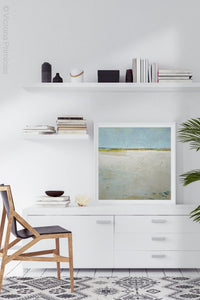 Zen muted abstract ocean art "Alabaster Sands," digital download by Victoria Primicias, decorates the office.