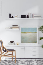 Load image into Gallery viewer, Gray abstract ocean art &quot;Alabaster Sands,&quot; metal print by Victoria Primicias, decorates the office.
