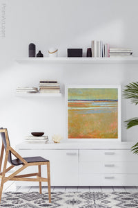 Golden abstract beach wall decor "Amber Keys," metal print by Victoria Primicias, decorates the office.