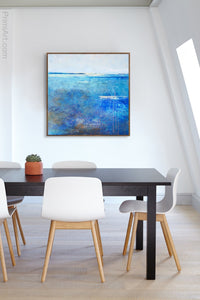 Blue abstract coastal wall decor "Arctic Tidings," fine art print by Victoria Primicias, decorates the office.