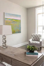 Load image into Gallery viewer, Yellow green abstract landscape art &quot;Bellini Fields,&quot; digital artwork by Victoria Primicias, decorates the office.
