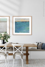 Load image into Gallery viewer, Blue abstract beach wall art &quot;Beryl Basin,&quot; printable wall art by Victoria Primicias, decorates the dining room.
