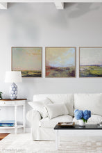 Load image into Gallery viewer, Coastal abstract landscape art &quot;Blue Promise,&quot; digital print by Victoria Primicias, decorates the living room.
