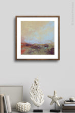 Load image into Gallery viewer, Unique abstract landscape art &quot;Blue Promise,&quot; fine art print by Victoria Primicias, decorates the wall.
