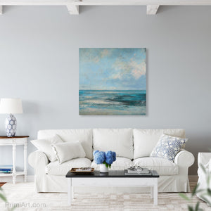 bluegreen square seascape painting above sofa