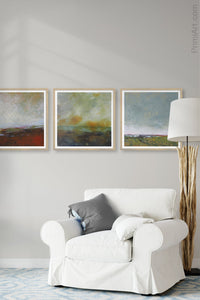 Unique abstract landscape art "Blushing Silence," digital download by Victoria Primicias, decorates the living room.