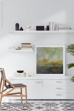 Load image into Gallery viewer, Square abstract landscape art &quot;Blushing Silence,&quot; giclee print by Victoria Primicias, decorates the office.
