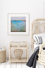 Load image into Gallery viewer, Blue abstract beach art &quot;Cantata Carolina,&quot; digital print by Victoria Primicias, decorates the bedroom.
