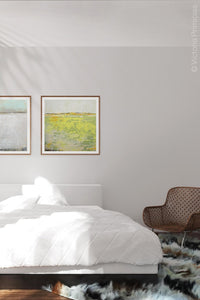 Bright abstract landscape art "Citrus Morning," downloadable art by Victoria Primicias, decorates the bedroom.