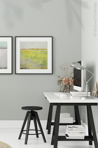 Bright landscape painting "Citrus Morning," downloadable art by Victoria Primicias, decorates the office.