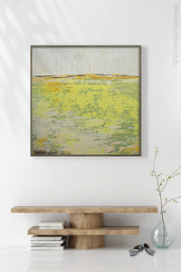 Sunny abstract landscape art "Citrus Morning," wall art print by Victoria Primicias, decorates the entryway.