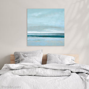cloudy abstract seascape painting above bed