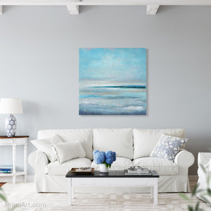 square blue coastal abstract landscape above sofa in living room