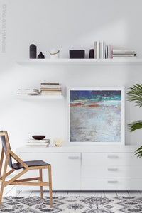 Blue and beige abstract coastal wall art "Cobalt Chorus," digital art by Victoria Primicias, decorates the office.