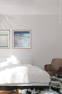 Modern abstract beach wall art "Cobalt Chorus," wall art print by Victoria Primicias, decorates the bedroom.