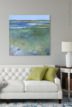 Load image into Gallery viewer, Blue abstract beach art &quot;Color Dance,&quot; digital print by Victoria Primicias, decorates the living room.
