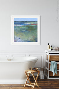 Coastal abstract seascape painting"Color Dance," wall art print by Victoria Primicias, decorates the bathroom.