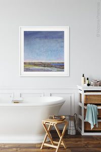 Blue abstract seascape painting "Confetti Chorus," wall art print by Victoria Primicias, decorates the bathroom.