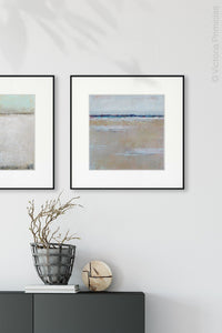 Beige muted abstract seascape painting "Crib Sheets," digital art landscape by Victoria Primicias, decorates the entryway.