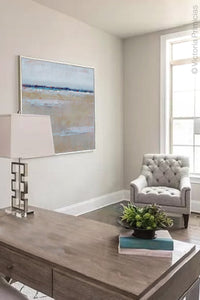 Beige muted abstract beach wall art "Crib Sheets," digital print by Victoria Primicias, decorates the office.