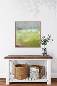 Yellow and gray abstract landscape art "Crimson Threads," digital download by Victoria Primicias, decorates the hallway.