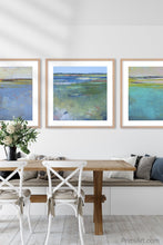 Load image into Gallery viewer, Blue abstract beach wall decor &quot;Daily Caller,&quot; metal print by Victoria Primicias, decorates the dining room.
