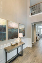 Load image into Gallery viewer, Indigo abstract ocean painting &quot;Deep End,&quot; downloadable art by Victoria Primicias, decorates the living room.
