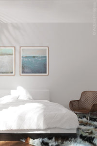 Teal abstract beach painting "Delicate Dawn," wall art print by Victoria Primicias, decorates the bedroom.