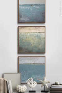 Teal abstract ocean painting "Delicate Dawn," fine art print by Victoria Primicias, decorates the foyer.