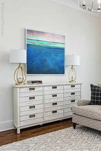 Load image into Gallery viewer, Blue impressionist abstract coastal wall art &quot;Evening Veil,&quot; digital download by Victoria Primicias, decorates the living room.
