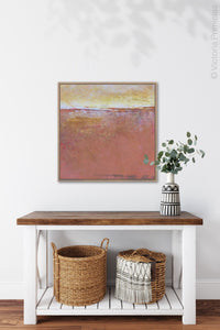 Red orange abstract beach wall art "Fading Beauty," digital artwork by Victoria Primicias, decorates the entryway.