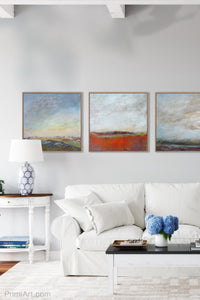 Square abstract landscape art "Faraway Nearby," digital artwork by Victoria Primicias, decorates the living room.