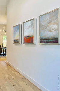 Square abstract landscape painting "Faraway Nearby," downloadable art by Victoria Primicias, decorates the entryway.