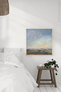 Square abstract landscape art "Faraway Nearby," printable wall art by Victoria Primicias, decorates the bedroom.
