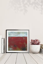Load image into Gallery viewer, Large red abstract beach wall decor &quot;Ferrari Run,&quot; giclee print by Victoria Primicias, decorates the shelf.
