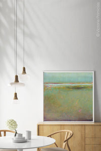 Coastal abstract landscape painting "Fine Margin," digital print by Victoria Primicias, decorates the dining room.