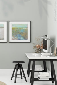 Large landscape painting "Floating Gallery," digital print by Victoria Primicias, decorates the office.
