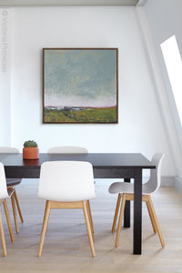 Serene abstract coastal wall decor "Golden Lining," digital print by Victoria Primicias, decorates the office.