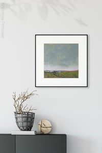Gray abstract coastal wall decor "Golden Lining," fine art print by Victoria Primicias, decorates the foyer.