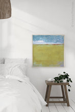 Load image into Gallery viewer, Gold coastal abstract coastal wall decor &quot;Golden Passage,&quot; digital download by Victoria Primicias, decorates the bedroom.
