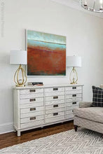 Load image into Gallery viewer, Unique abstract ocean wall art &quot;Havana Stories,&quot; printable wall art by Victoria Primicias, decorates the living room.
