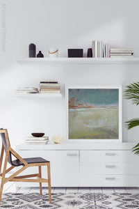 Zen abstract ocean painting "Hidden Sun," downloadable art by Victoria Primicias, decorates the office.